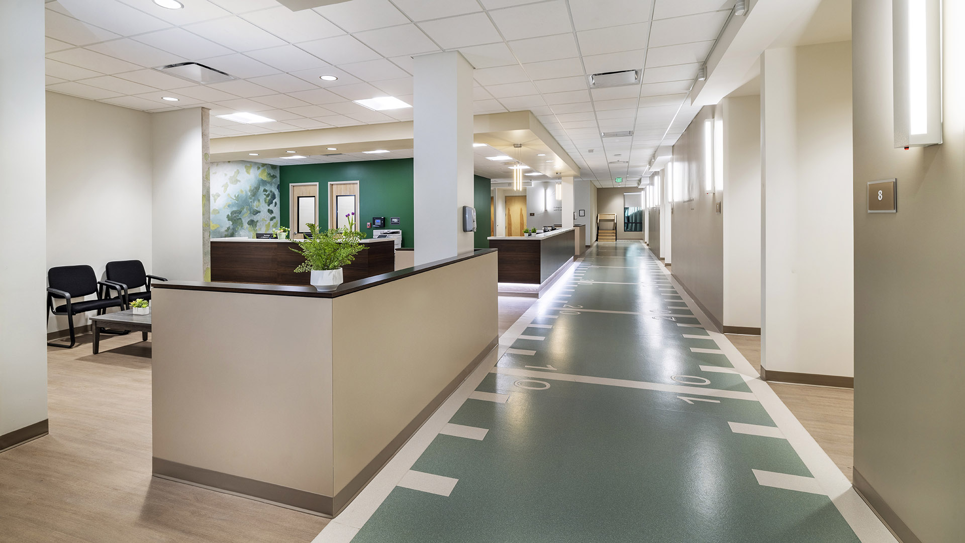 Alternate view of football field-decorated reception area at Crovetti Orthopaedics