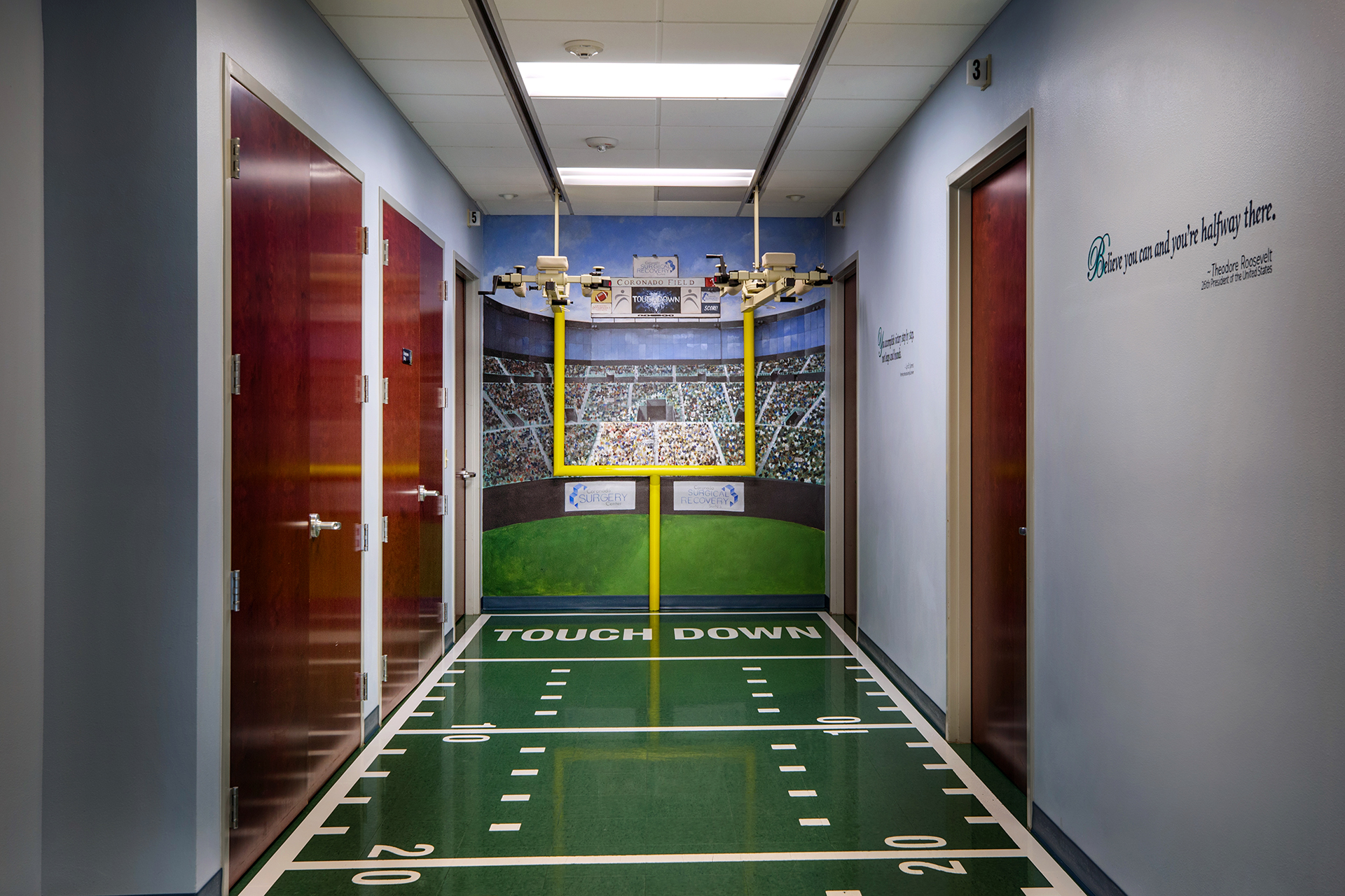 Football-themed decor in the lobby of the after-surgery recovery area at Crovetti Orthopaedics